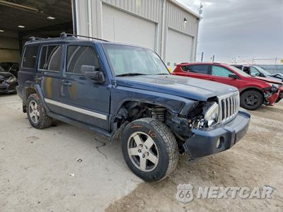 Czwarte zdjęcie samochodu z boku: 2010 JEEP COMMANDER SPORT VIN:1J4RG4GK5AC125443 - miniatura