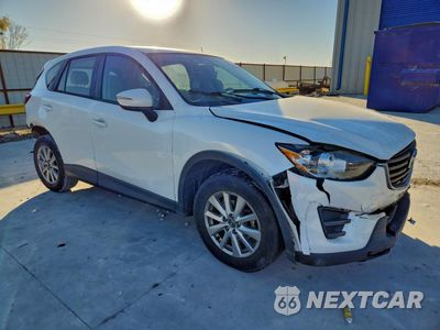 Czwarte zdjęcie samochodu z boku: 2016 MAZDA CX-5 SPORT VIN:JM3KE2BY5G0917297 - miniatura