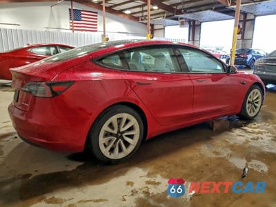Trzecie zdjęcie samochodu z tyłu: 2021 TESLA MODEL 3 VIN:5YJ3E1EB2MF032552 - miniatura