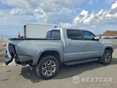 Trzecie zdjęcie samochodu z tyłu: 2018 TOYOTA TACOMA DOUBLE CAB VIN:3TMGZ5AN5JM161972 - miniatura
