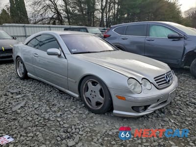 Czwarte zdjęcie samochodu z boku: 2001 MERCEDES-BENZ CL 500 VIN:WDBPJ75JX1A017372 - miniatura