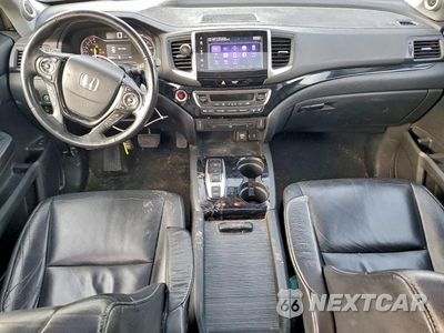 Zdjęcie 8 z 12 samochodu: 2017 HONDA PILOT TOURING VIN:5FNYF5H94HB002641 - miniatura