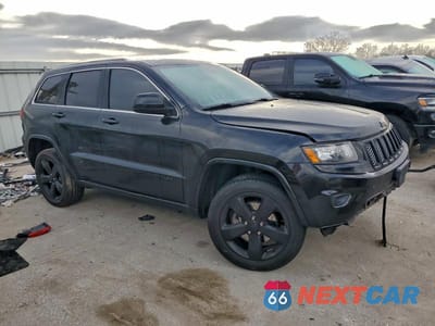 Czwarte zdjęcie samochodu z boku: 2015 JEEP GRAND CHEROKEE LAREDO VIN:1C4RJFAG3FC189897 - miniatura