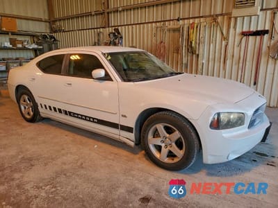 Czwarte zdjęcie samochodu z boku: 2010 DODGE CHARGER SXT VIN:2B3CA3CV5AH267779 - miniatura