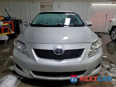 Piąte zdjęcie samochodu w środku: 2010 TOYOTA COROLLA LE VIN:JTDBU4EE4AJ073957 - miniatura