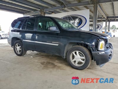 Czwarte zdjęcie samochodu z boku: 2006 GMC ENVOY VIN:1GKDS13S362332224 - miniatura