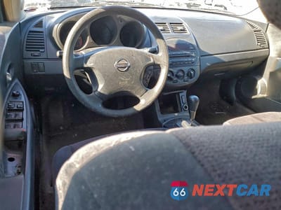 Zdjęcie 8 z 11 samochodu: 2002 NISSAN ALTIMA BASE VIN:1N4AL11D12C233718 - miniatura