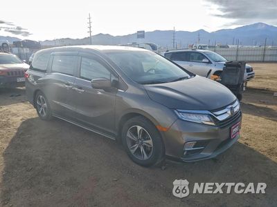 Czwarte zdjęcie samochodu z boku: 2018 HONDA ODYSSEY TOURING VIN:5FNRL6H80JB010588 - miniatura
