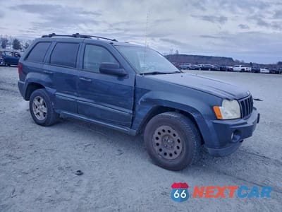 Czwarte zdjęcie samochodu z boku: 2007 JEEP GRAND CHEROKEE LAREDO VIN:1J8GR48K67C662815 - miniatura