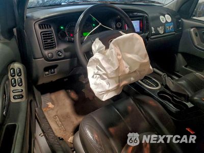 Zdjęcie 8 z 14 samochodu: 2005 MAZDA TRIBUTE S VIN:4F2CZ06125KM28733 - miniatura