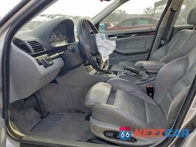 Zdjęcie 7 z 14 samochodu: 2002 BMW 325 I VIN:WBAET37442NJ21656 - miniatura