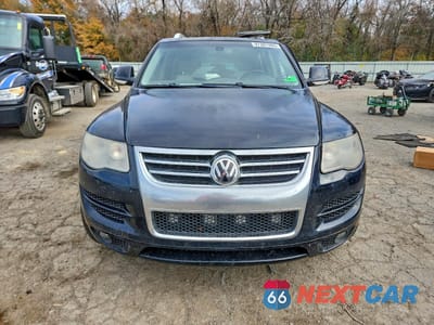 Piąte zdjęcie samochodu w środku: 2010 VOLKSWAGEN TOUAREG 2 VIN:WVGFK7A94AD004228 - miniatura