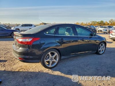 Trzecie zdjęcie samochodu z tyłu: 2012 FORD FOCUS TITANIUM VIN:1FAHP3J24CL378654 - miniatura