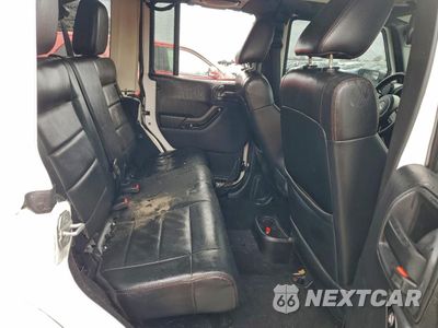 Zdjęcie 10 z 12 samochodu: 2012 JEEP WRANGLER UNLIMITED SAHARA VIN:1C4BJWEG4CL282872 - miniatura