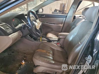 Zdjęcie 7 z 11 samochodu: 2002 TOYOTA CAMRY LE VIN:4T1BF30K52U015787 - miniatura