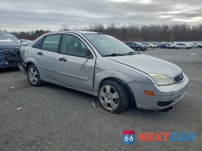 Czwarte zdjęcie samochodu z boku: 2006 FORD FOCUS ZX4 VIN:1FAFP34N76W151930 - miniatura