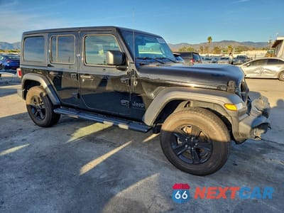 Czwarte zdjęcie samochodu z boku: 2023 JEEP WRANGLER SPORT VIN:1C4HJXDG3PW582084 - miniatura