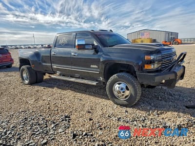Czwarte zdjęcie samochodu z boku: 2016 CHEVROLET SILVERADO K3500 HIGH COUNTRY VIN:1GC4K1E83GF174216 - miniatura