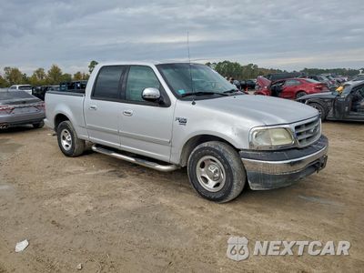 Czwarte zdjęcie samochodu z boku: 2001 FORD F150 SUPERCREW VIN:1FTRW07LX1KD70013 - miniatura