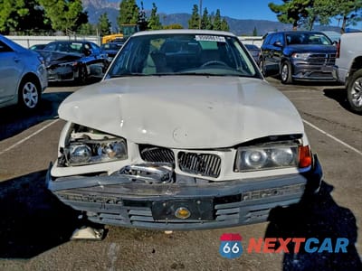 Piąte zdjęcie samochodu w środku: 1993 BMW 318 I VIN:WBACA5315PFG05926 - miniatura