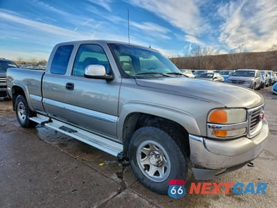 Czwarte zdjęcie samochodu z boku: 2001 GMC NEW SIERRA K1500 VIN:1GTEK19T51E177120 - miniatura