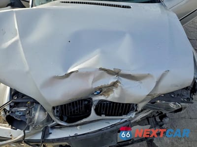 Zdjęcie 11 z 14 samochodu: 2002 BMW 325 I VIN:WBAET37442NJ21656 - miniatura