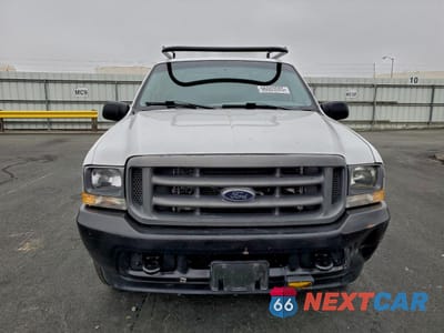 Piąte zdjęcie samochodu w środku: 2002 FORD F250 SUPER DUTY VIN:1FTNF20L62EB26170 - miniatura