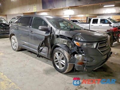 Czwarte zdjęcie samochodu z boku: 2016 FORD EDGE SEL VIN:2FMPK4J94GBB65793 - miniatura