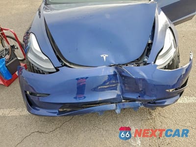 Zdjęcie 11 z 11 samochodu: 2022 TESLA MODEL 3 VIN:5YJ3E1EC3NF295403 - miniatura