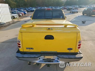 Zdjęcie 10 z 15 samochodu: 2003 FORD F150 VIN:1FTRF07L13KA43275 - miniatura