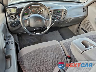 Zdjęcie 8 z 14 samochodu: 1999 FORD F150 VIN:1FTRX18L8XNB93468 - miniatura