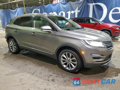 Czwarte zdjęcie samochodu z boku: 2017 LINCOLN MKC SELECT VIN:5LMCJ2D93HUL34678 - miniatura