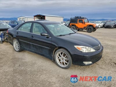 Czwarte zdjęcie samochodu z boku: 2003 TOYOTA CAMRY XLE V6 VIN:JTDBF30K830094269 - miniatura