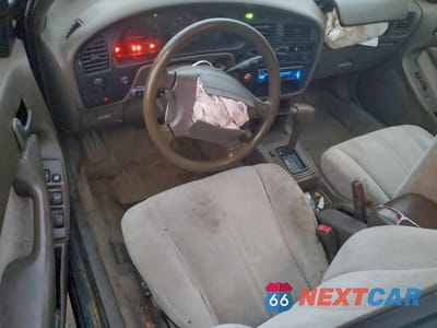 Zdjęcie 8 z 14 samochodu: 1996 TOYOTA CAMRY DX VIN:4T1BG12K9TU822863 - miniatura