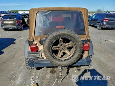 Zdjęcie 6 z 11 samochodu: 1999 JEEP WRANGLER / TJ SPORT VIN:1J4FY19S0XP440759 - miniatura