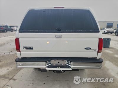 Zdjęcie 6 z 12 samochodu: 1997 FORD F350 VIN:1FTJW36F3VEA37540 - miniatura