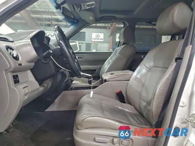 Zdjęcie 7 z 13 samochodu: 2012 HONDA PILOT TOURING VIN:5FNYF4H91CB052836 - miniatura