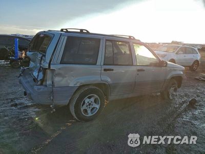 Trzecie zdjęcie samochodu z tyłu: 1997 JEEP GRAND CHEROKEE LAREDO VIN:1J4GZ58S9VC709050 - miniatura