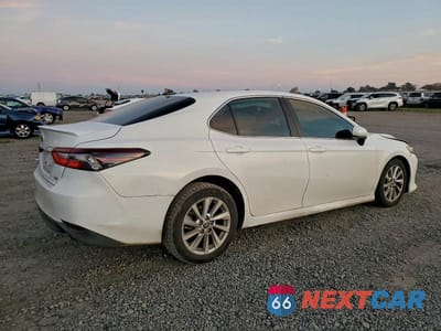 Trzecie zdjęcie samochodu z tyłu: 2022 TOYOTA CAMRY LE VIN:4T1C11AK2NU629240 - miniatura