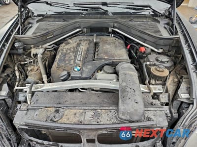 Zdjęcie 12 z 13 samochodu: 2013 BMW X5 XDRIVE35I VIN:5UXZV4C50D0B02753 - miniatura