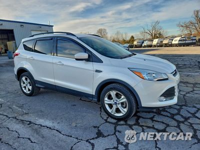 Czwarte zdjęcie samochodu z boku: 2016 FORD ESCAPE SE VIN:1FMCU0GX9GUC67396 - miniatura