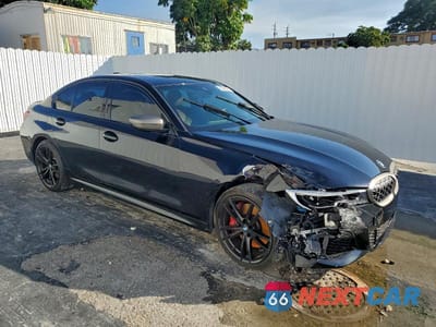 Czwarte zdjęcie samochodu z boku: 2021 BMW M340I VIN:3MW5U7J04M8B51997 - miniatura