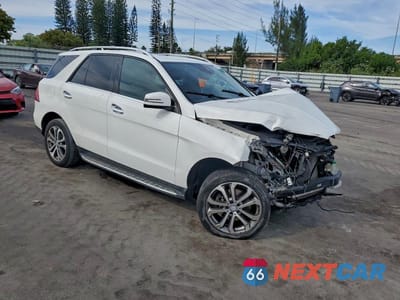 Czwarte zdjęcie samochodu z boku: 2016 MERCEDES-BENZ GLE 350 VIN:4JGDA5JB4GA744843 - miniatura