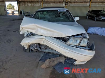 Piąte zdjęcie samochodu w środku: 1999 TOYOTA AVALON XL VIN:4T1BF18B1XU321742 - miniatura