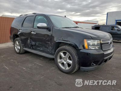 Czwarte zdjęcie samochodu z boku: 2012 CHEVROLET TAHOE C1500 LS VIN:1GNSCAE02CR186971 - miniatura
