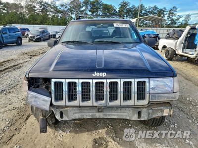 Piąte zdjęcie samochodu w środku: 1997 JEEP GRAND CHEROKEE LAREDO VIN:1J4GZ58S6VC531856 - miniatura