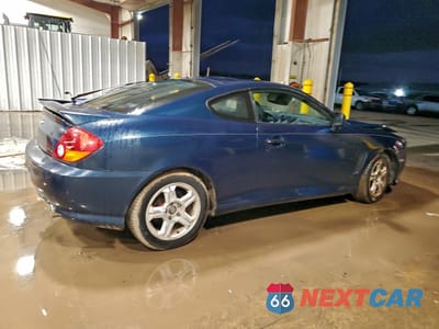 Trzecie zdjęcie samochodu z tyłu: 2003 HYUNDAI TIBURON GT VIN:KMHHN65F13U029035 - miniatura