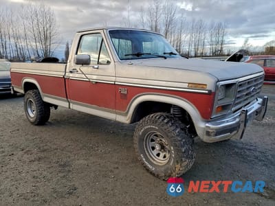 Czwarte zdjęcie samochodu z boku: 1985 FORD F150 VIN:1FTEF14N2FPB40339 - miniatura