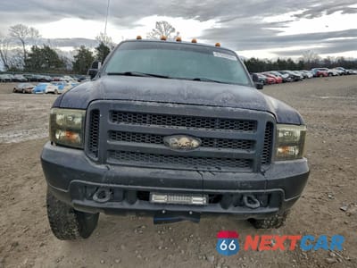 Piąte zdjęcie samochodu w środku: 2000 FORD F250 SUPER DUTY VIN:1FTNX21F3YEC51013 - miniatura