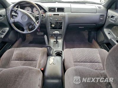 Zdjęcie 8 z 14 samochodu: 1999 NISSAN MAXIMA GLE VIN:JN1CA21D0XT210309 - miniatura